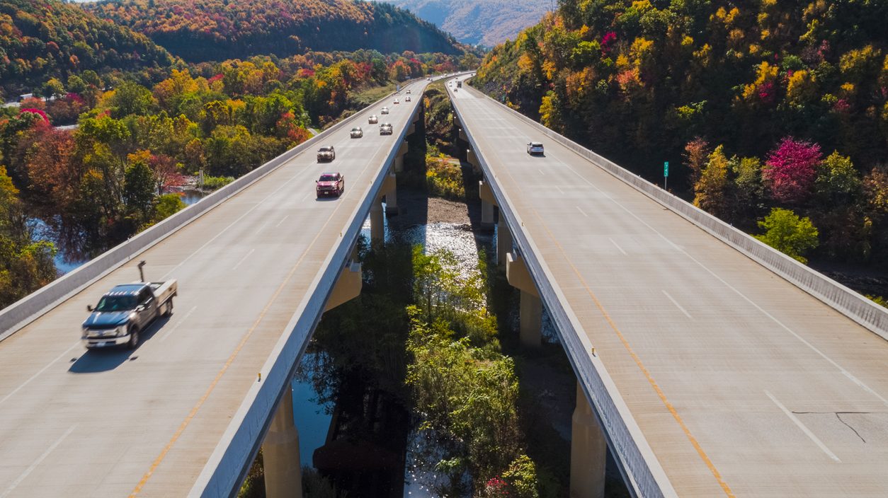 Aerial view of a turnpike bridge in autumn