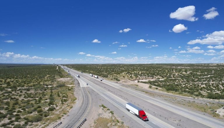 Aerial view of semi trucks on Interstate 10 in Texas