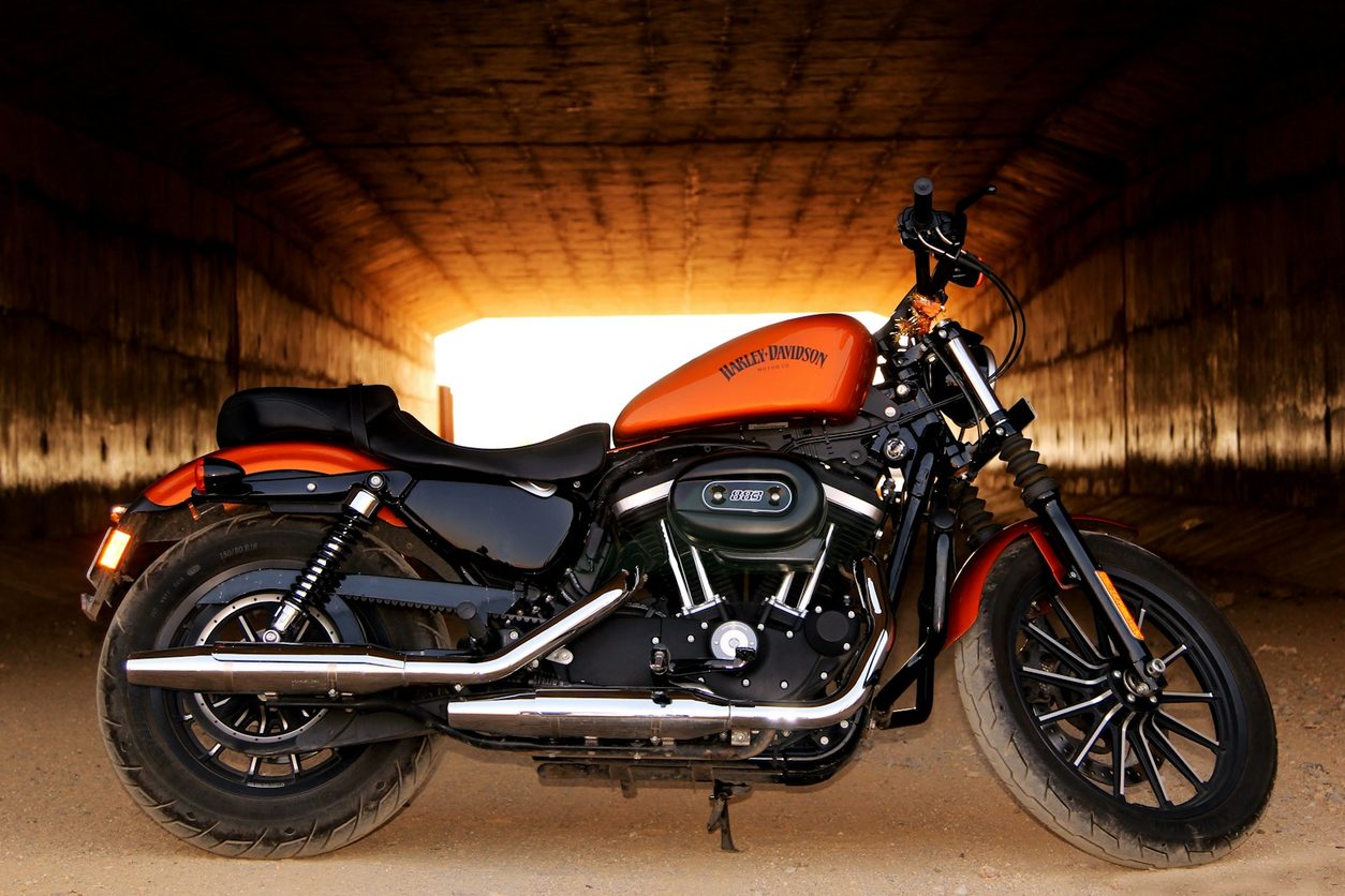 Rider on a cruiser motorcycle on an open highway
