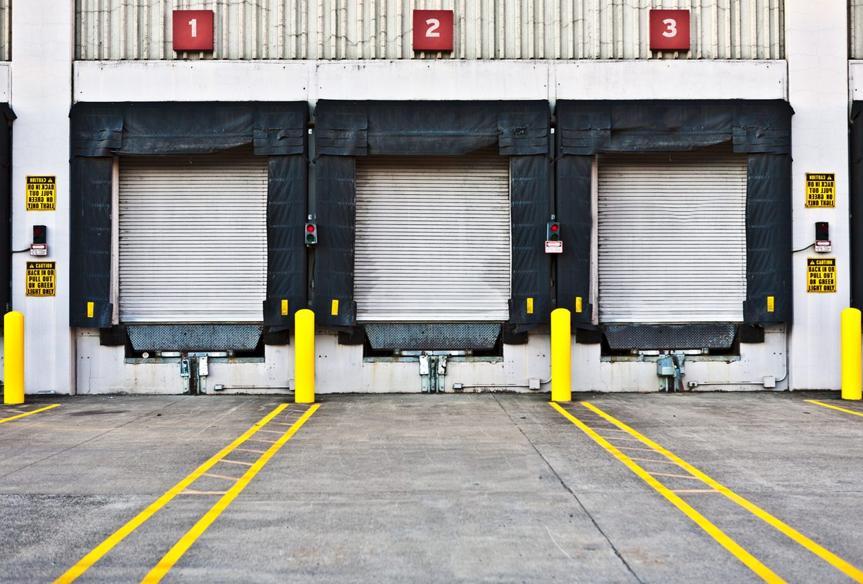 Numbered loading dock doors at a warehouse