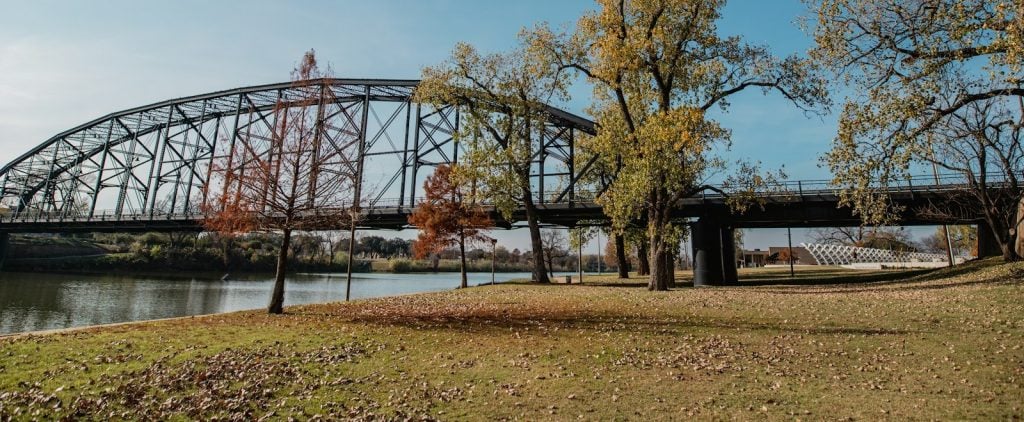 The historic Washington Avenue truss bridge spanning the Brazos River in Waco, Texas